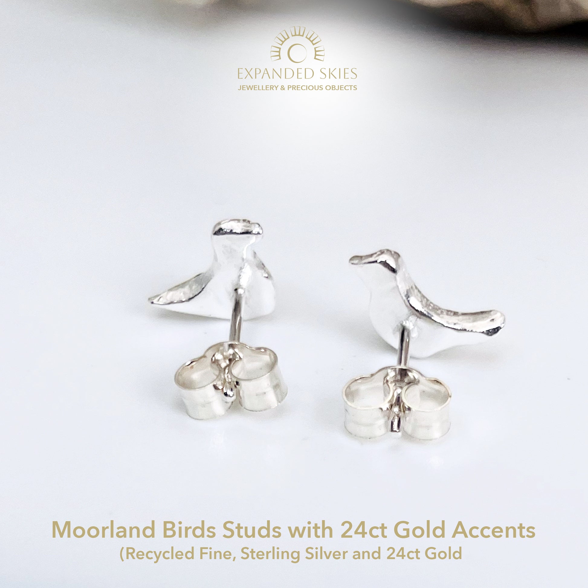 The Moorland Bird Studs are handcrafted in recycled fine silver and recycled 24ct gold accents with recycled sterling silver ear pins and scrolls, each bird is unique. Simple and elegant with a hammered finish, they can be worn everyday for any occasion.