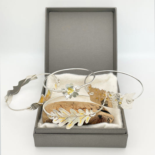 Ashburton Jewellery School, workshop 'Create a beautiful silver bangle with 24ct gold accents, inspired by the landscapes of Dartmoor'. Learn the Korean gold gilding technique of Keum Boo, and learn, or develop your skills, in saw piercing, forming, filing and polishing.