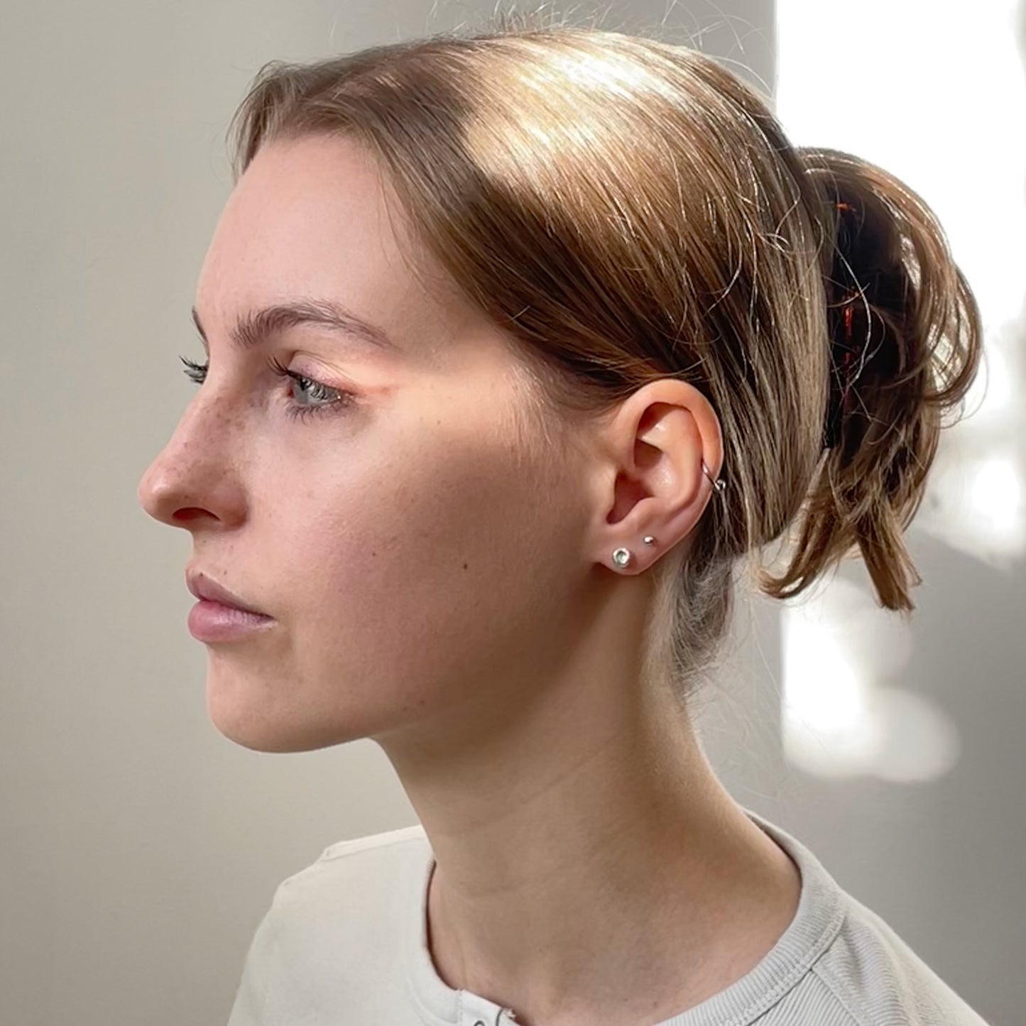 Inspired by the sculptural beauty of the Dartmoor granite rocks. The Dartmoor Rocks Studs are handcrafted in recycled fine silver with recycled sterling silver ear pins and scrolls, each stud is unique. Simple and elegant with a textured finish, and a polished finish they can be worn everyday for any occasion.