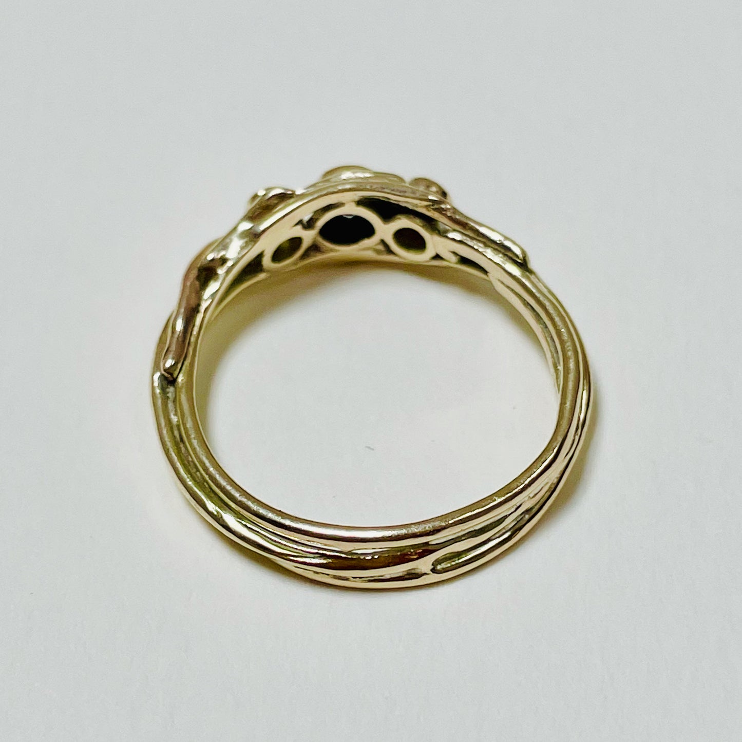 The Haytor Heather and Gorse Ring evokes the beautiful yellows of the gorse and purples of the heather with ethically sourced yellow sapphires and a purple spinel held in three twisting branches of 9ct yellow with accents of 9ct rose gold . This totally handcrafted piece makes a wonderful gift, engagement ring or perfect encapsulation of joy.