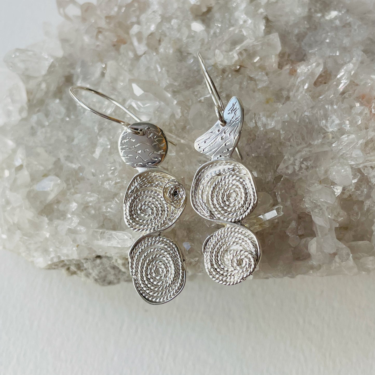 The River Dart Filigree Earrings are inspired by the River Dart that eddy around rocks, turning the flow into tiny whirlpools.