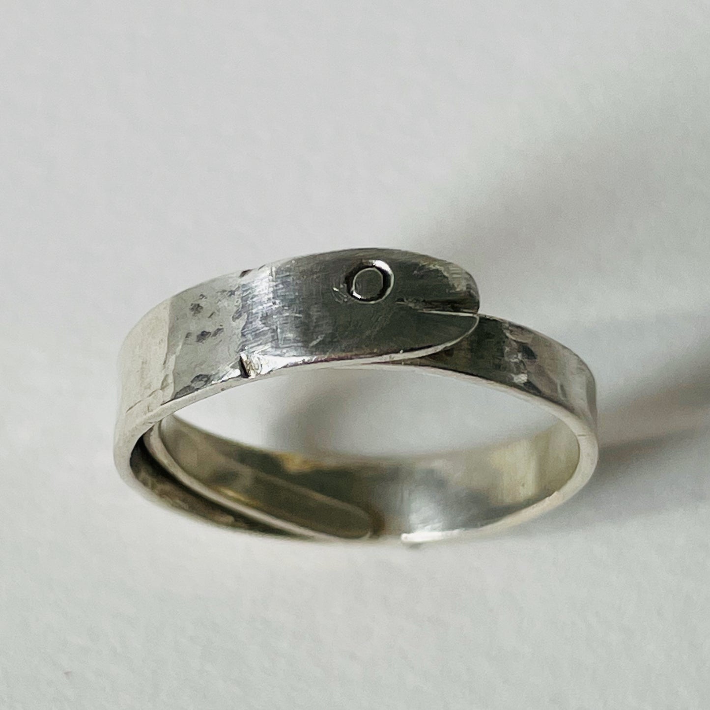 The Expanded Skies Ouroboros Snake ring is totally handcrafted in 100% recycled sterling silver, with etched details. The ouroboros, the snake or dragon eating its tail, is an ancient Egyptian, Greek, Chinese and also a medieval alchemical symbol. The ouroboros represents the cycle of life and eternal renewal. The ouroboros reminds us that all of life is energy and energy doesn't disappear, it transforms.