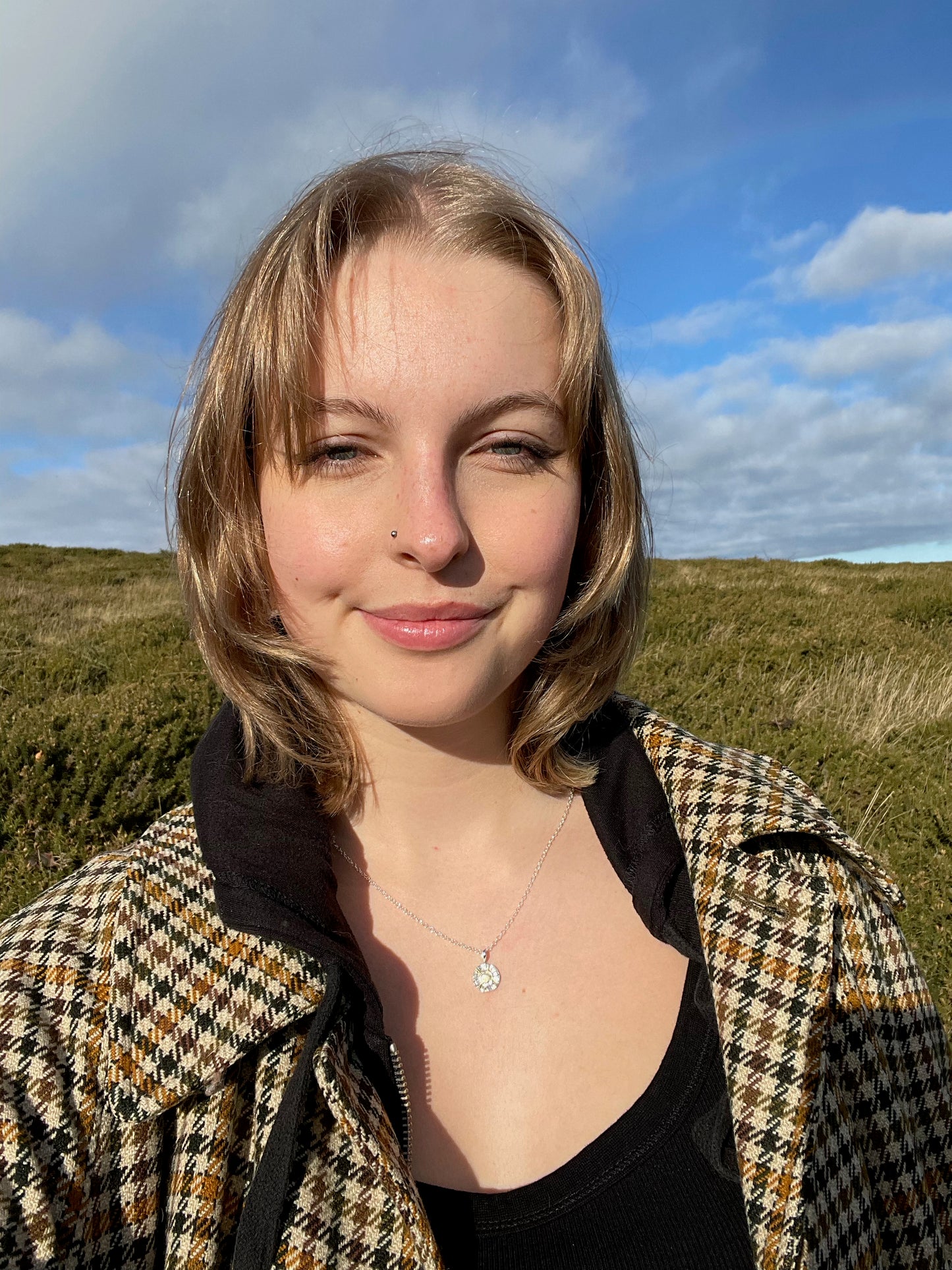 The Radiant Sun Pendant is joyful! Hand sculpted in recycled solid fine silver (999) with a textured surface with a twinkly beauty. It can be worn everyday or as a beautiful detail on more formal occasions.