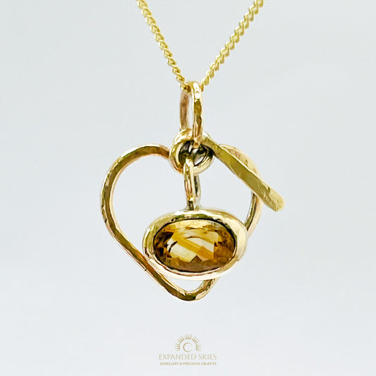 The Expanded Skies Joyful Heart Pendant has a beautiful faceted burnt citrine set in 9ct gold bezel on a 9ct gold heart. Totally handcrafted on the edge of Dartmoor and made from high quality recycled gold. Understated and beautiful, it can be worn every day or for special occasions.