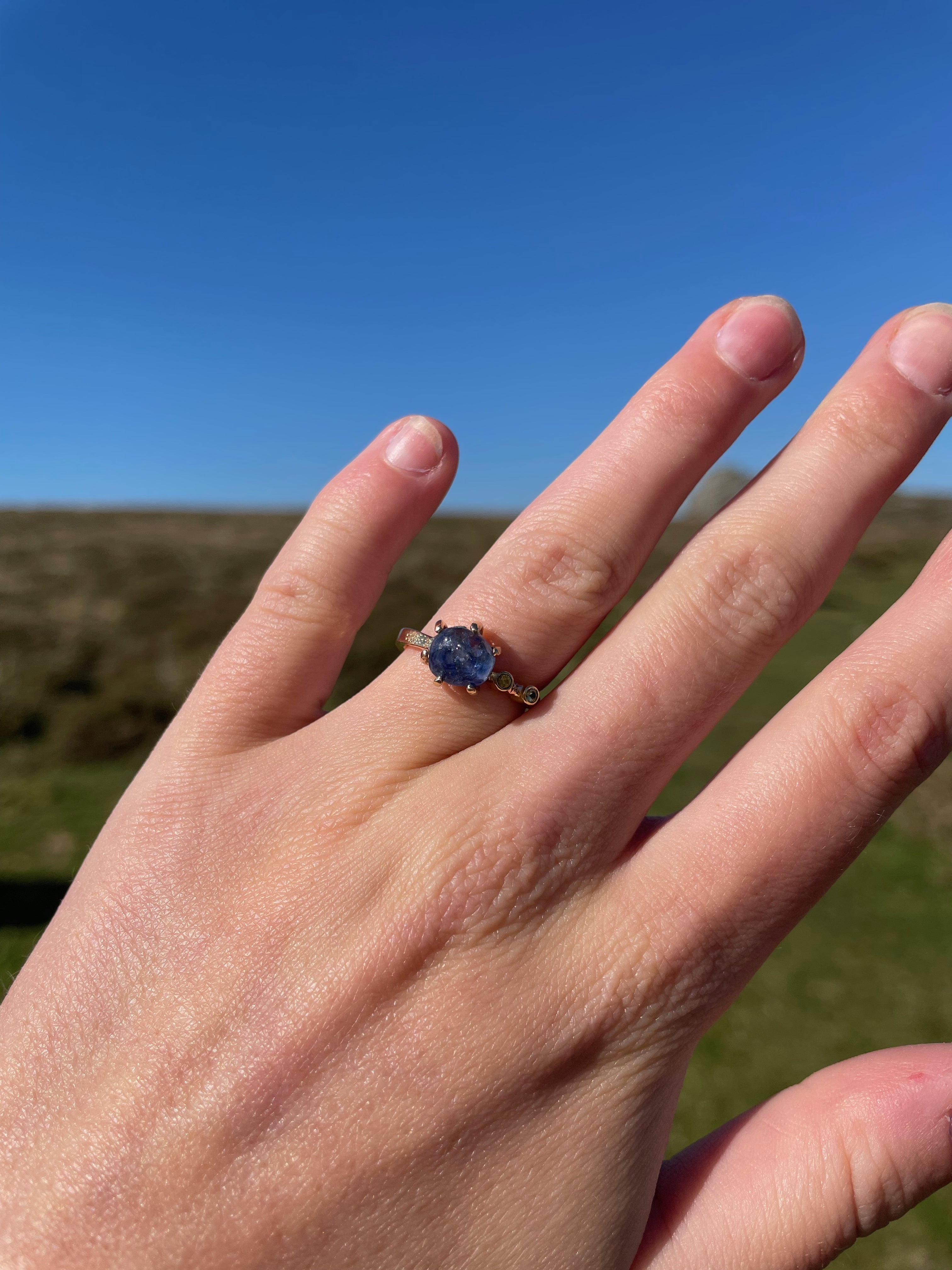 Expanded Skies Dartmoor Sun and Skies, Raw Blue Sapphire Ring with with faceted yellow sapphires