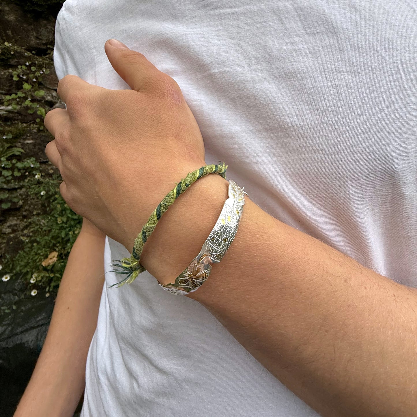 The Expanded Skies Dartmoor Purslane, Hand Engraved Bracelet, celebrates the beauty of the edible Dartmoor flower the Pink Purslane (Claytonia sibirica), created in fine and sterling silver with 24ct gold accents.