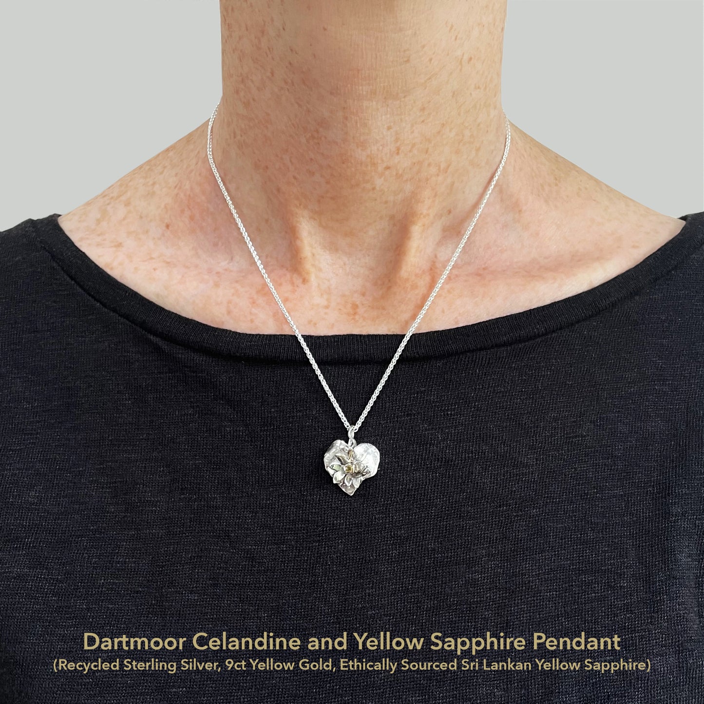 Expanded Skies Expanded Skies Celandine Sapphire Pendant, inspired by the profusion of celandine petals found in the meadow near Cuddyford and all along the Dartmoor byways, pure joy! With a 9ct gold or sterling silver chain. Pendant with 16 inch sterling silver chain pictured.