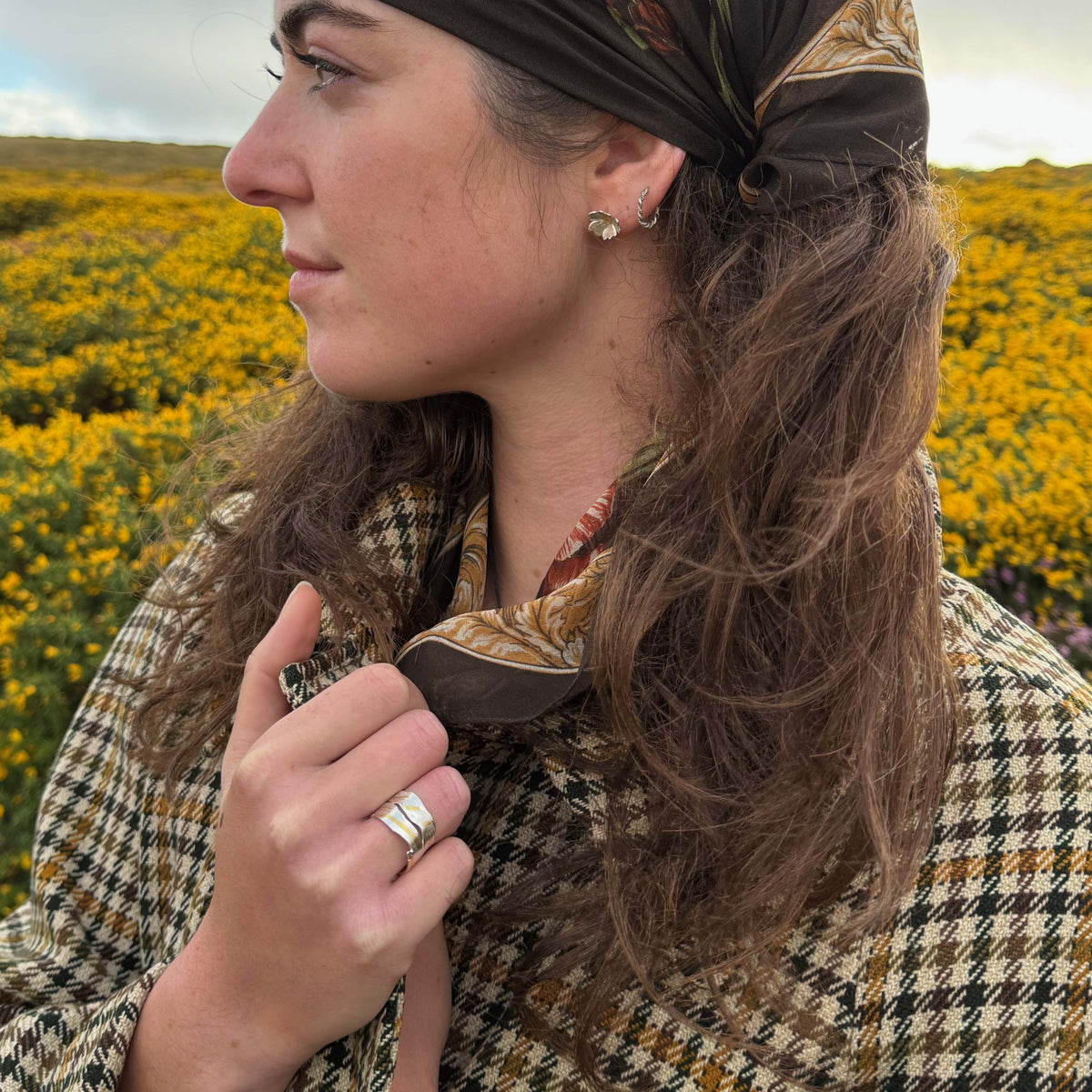 Expanded Skies River Dart Riverbed Ring with 24ct Gold Accents is inspired by the River Dart drawn with hand engraving and gold accents.