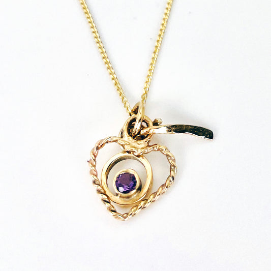 The Expanded Skies Joyful Heart Amethyst Filigree Necklace Pendant has a beautiful ethically sourced faceted amethyst set in 9ct gold bezel on a 9ct filigree gold heart. Totally handcrafted on the edge of Dartmoor and made from high quality recycled gold. Understated and beautiful, it can be worn every day or for special occasions.