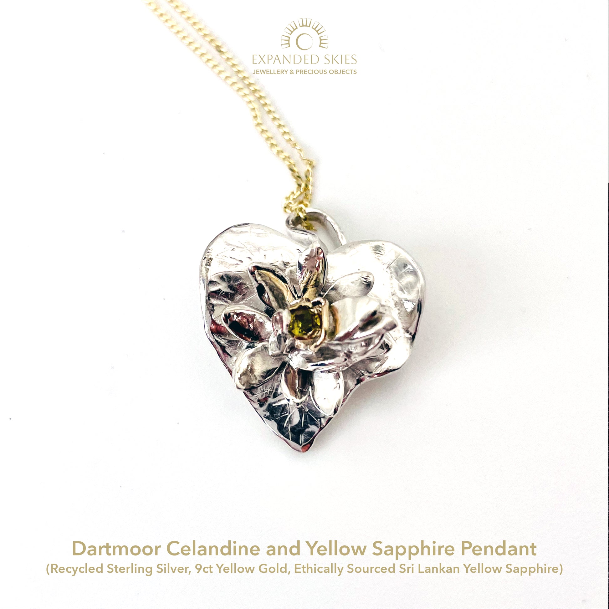 Expanded Skies Celandine Sapphire Pendant, inspired by the profusion of celandine petals found in the meadow near Cuddyford and all along the Dartmoor byways, pure joy! With a 9ct gold or sterling silver chain.
