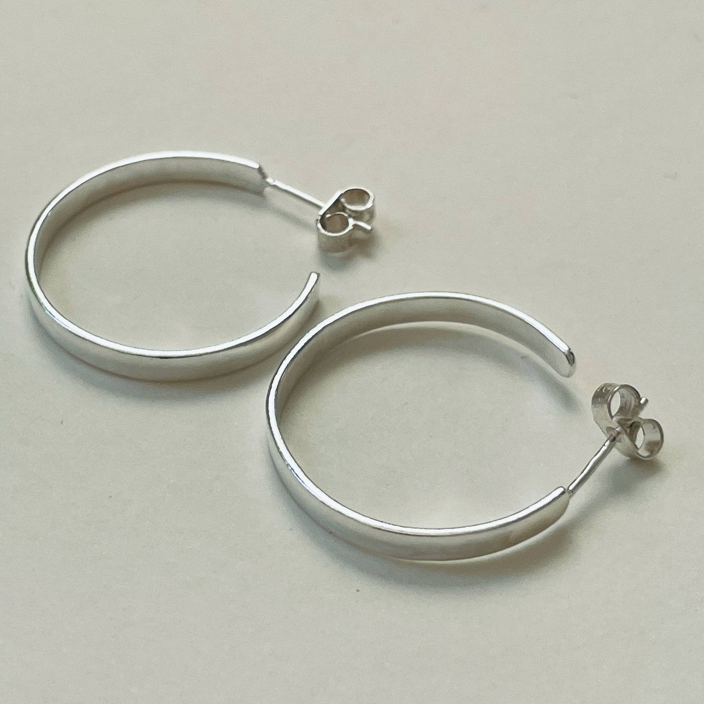  The Expanded Skies, Dartmoor Hoop Earrings are handcrafted from solid recycled sterling silver with a recycled sterling silver pin and scroll back. Simple and elegant, they can be worn everyday to accompany any occasion.