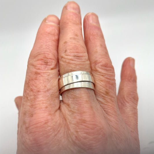 Ashburton Jewellery School Create a Chunky Silver Ring  in this fun workshop on Saturday 6 September  2025. Picture of the Chunky Ring on a hand.