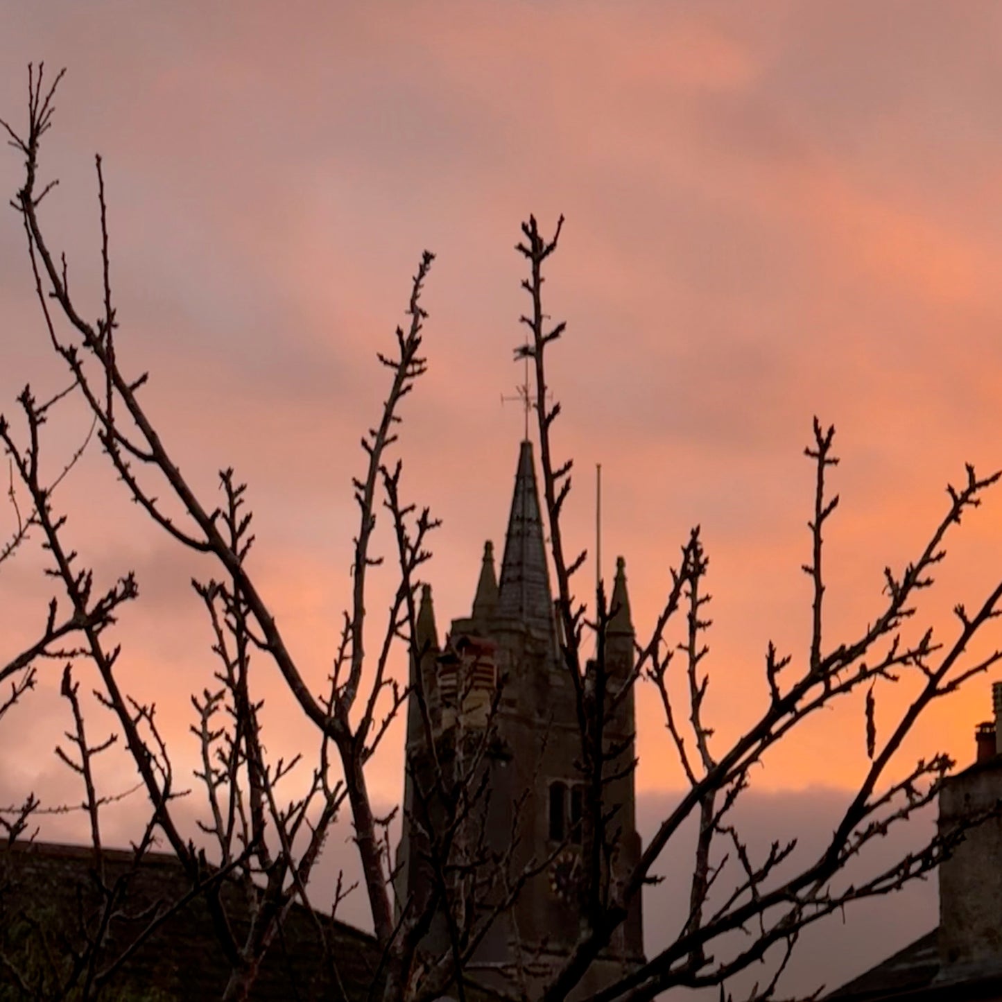 Dartmoor sunrise over St. Lawrence Chapel, Ashburton. The Expanded Skies Expanded Skies Dartmoor Sun and Stars Pink Sapphire Brooch is inspired by the rising sun and the emerging stars in Dartmoor skies. Created with hand engraving and gold accents with a beautiful pink sapphire.