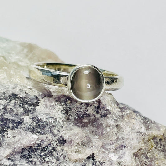 The Expanded Skies Full Moon Moonstone Ring has a tranquil beauty of the light of the full moon reflected on a still pool. Totally handcrafted, it features an ethically mined moonstone from Sri Lanka set in quality 100% recycled sterling silver with a hammered band.&nbsp;