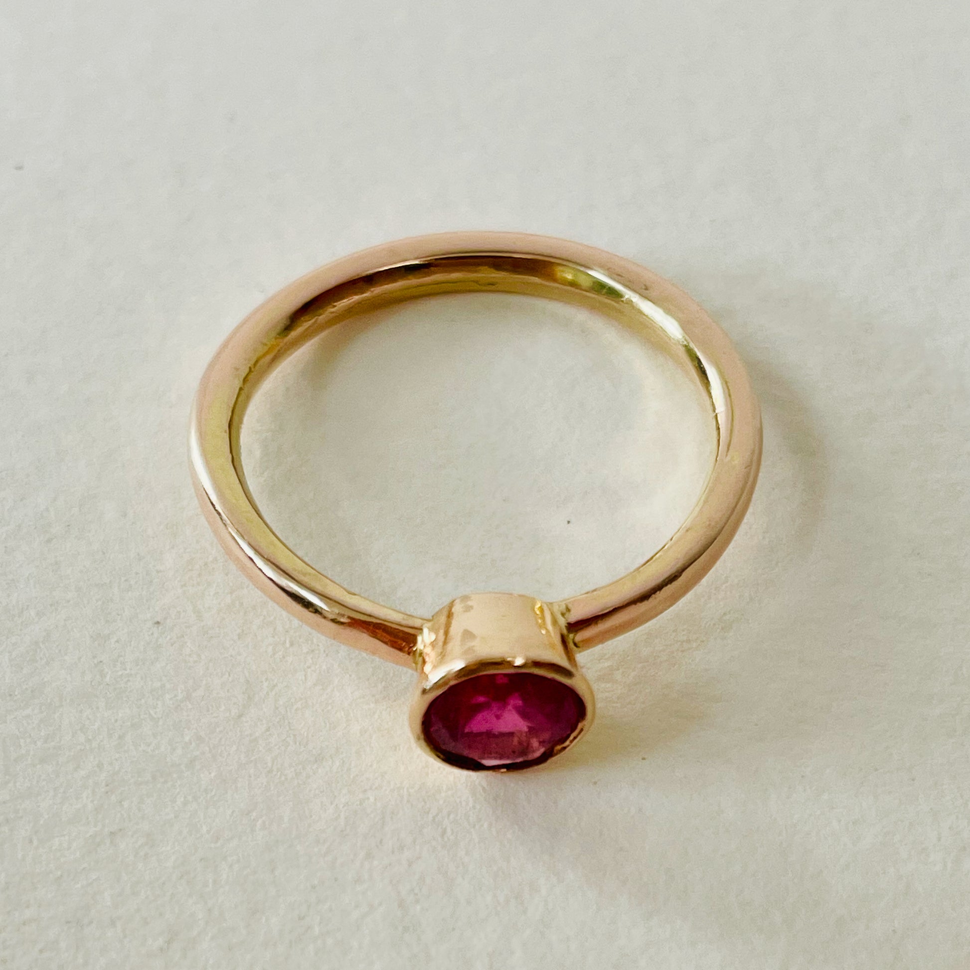 The Ruby Chalice Ring has a stunningly beautiful ethically sourced Tanzanian deep pink-red ruby, encircled with 18ct rose gold tapered chalice on a 9ct rose gold band. This totally handcrafted piece makes a wonderful gift, engagement ring or perfect encapsulation of love and joy.