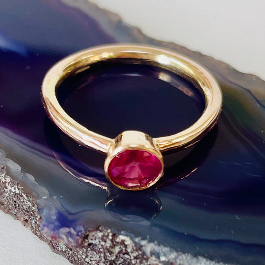 The Ruby Chalice Ring has a stunningly beautiful ethically sourced Tanzanian deep pink-red ruby, encircled with 18ct rose gold tapered chalice on a 9ct rose gold band. This totally handcrafted piece makes a wonderful gift, engagement ring or perfect encapsulation of love and joy.