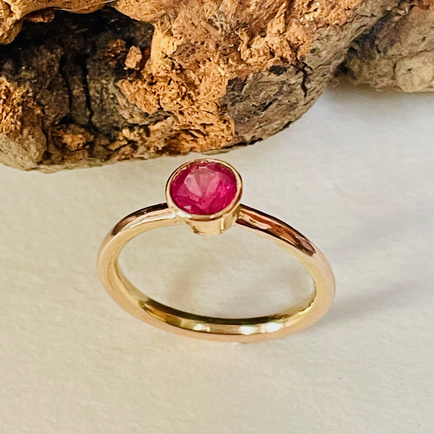 The Ruby Chalice Ring has a stunningly beautiful ethically sourced Tanzanian deep pink-red ruby, encircled with 18ct rose gold tapered chalice on a 9ct rose gold band. This totally handcrafted piece makes a wonderful gift, engagement ring or perfect encapsulation of love and joy.