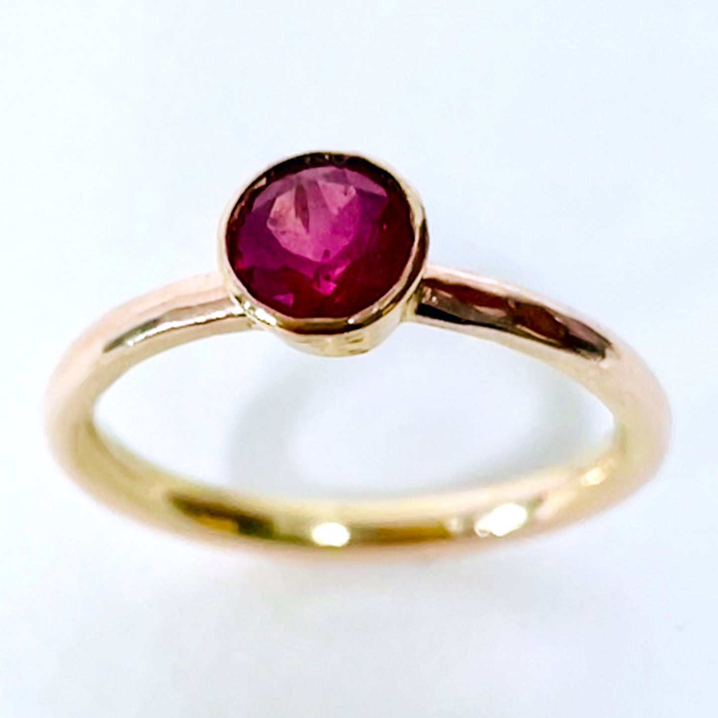 The Expanded Skies Ruby Chalice Ring has a stunningly beautiful ethically sourced Tanzanian deep pink-red ruby, encircled with 18ct rose gold tapered chalice on a 9ct rose gold band. This totally handcrafted piece makes a wonderful gift, engagement ring or perfect encapsulation of love and joy.