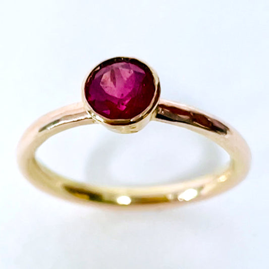 The Expanded Skies Ruby Chalice Ring has a stunningly beautiful ethically sourced Tanzanian deep pink-red ruby, encircled with 18ct rose gold tapered chalice on a 9ct rose gold band. This totally handcrafted piece makes a wonderful gift, engagement ring or perfect encapsulation of love and joy.